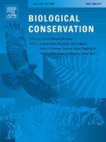 Biological Conservation journal cover: collage of images including an eagle and a fern leaf, all covered with a wash of blue