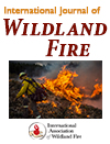 Wildland Fire journal cover featuring an image of a fire