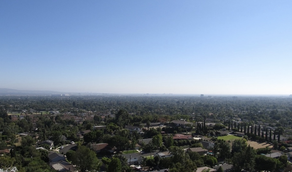 Orange County meets the horizon of a blue sky