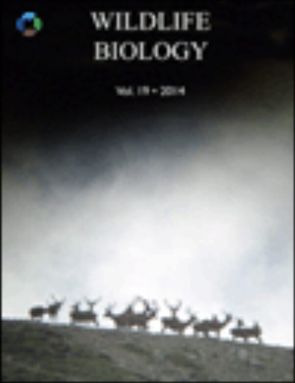 Wildlife Biology Journal cover featuring a silhouette photo of a herd of deer