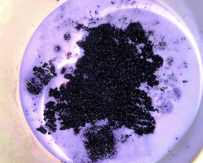 "Vanadium, one of the CO2 capture materials, displaying a brilliant deep purple color (image provided by May Nyman, chemistry professor, OSU College of Science)". This photo was taken directly from the OSU article cited on this page.