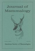 Journal of Mammalogy journal cover - teal bluw with a black outline sketch of a male elk